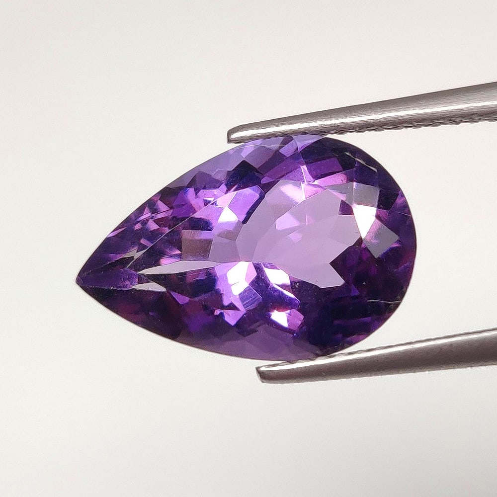 5.32 Ct Natural Purple Amethyst Pear Cut: Weight - 5.32 Ct / Dimensions - 15.30 x 10.10 x 7.10 mm / Shape - Pear Cut / Color - Purple / Clarity - VVS / Origin -Brazil / Treatment - Heated