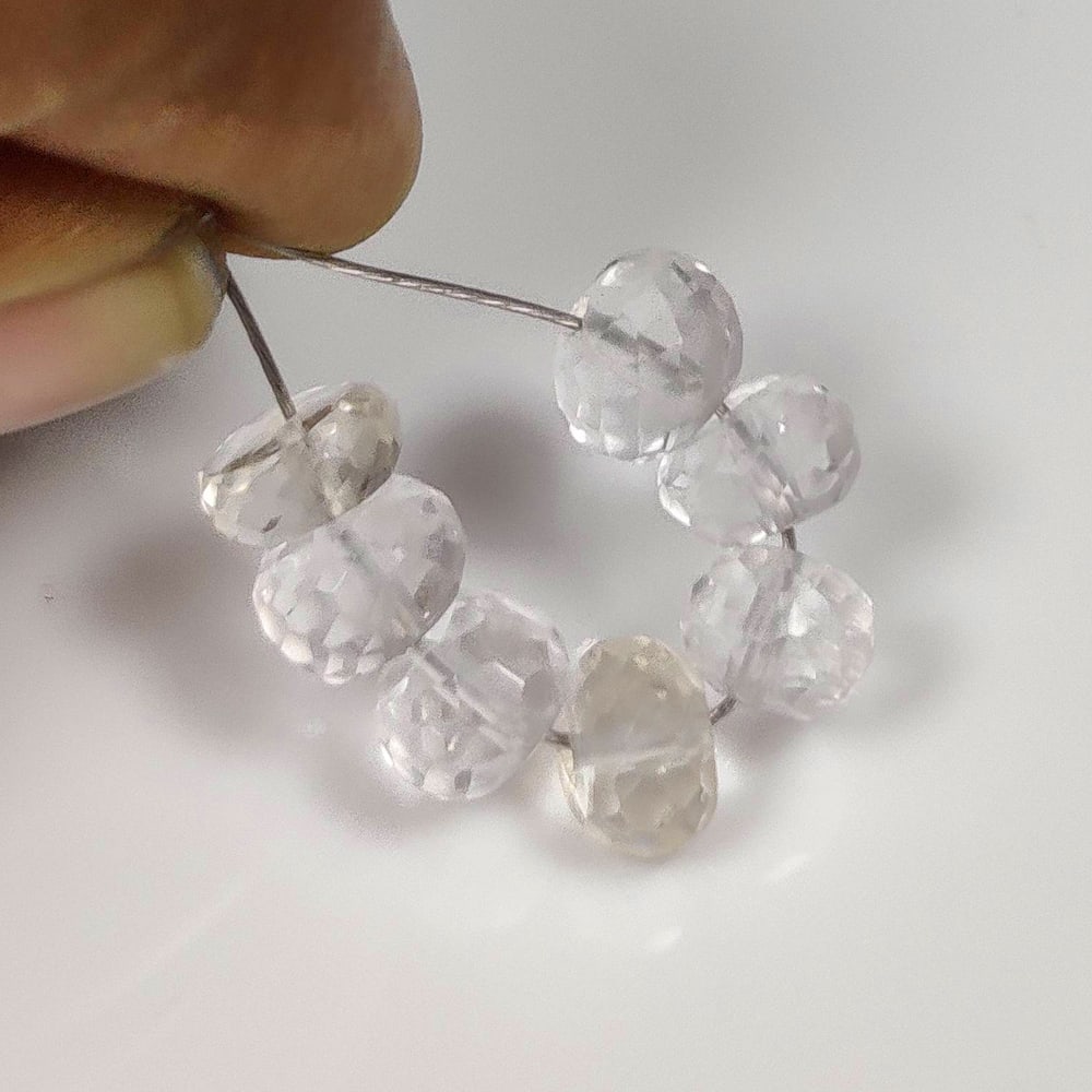 10.38 Ct Natural Colorless Quartz Round Cut Beads: Weight - 10.38 Ct / Dimensions - 6.10 - 6.70 mm / 7 Pc's / Shape - Round Cut Beads / Clarity - Transparnet / Origin - Brazil / Treatment - None