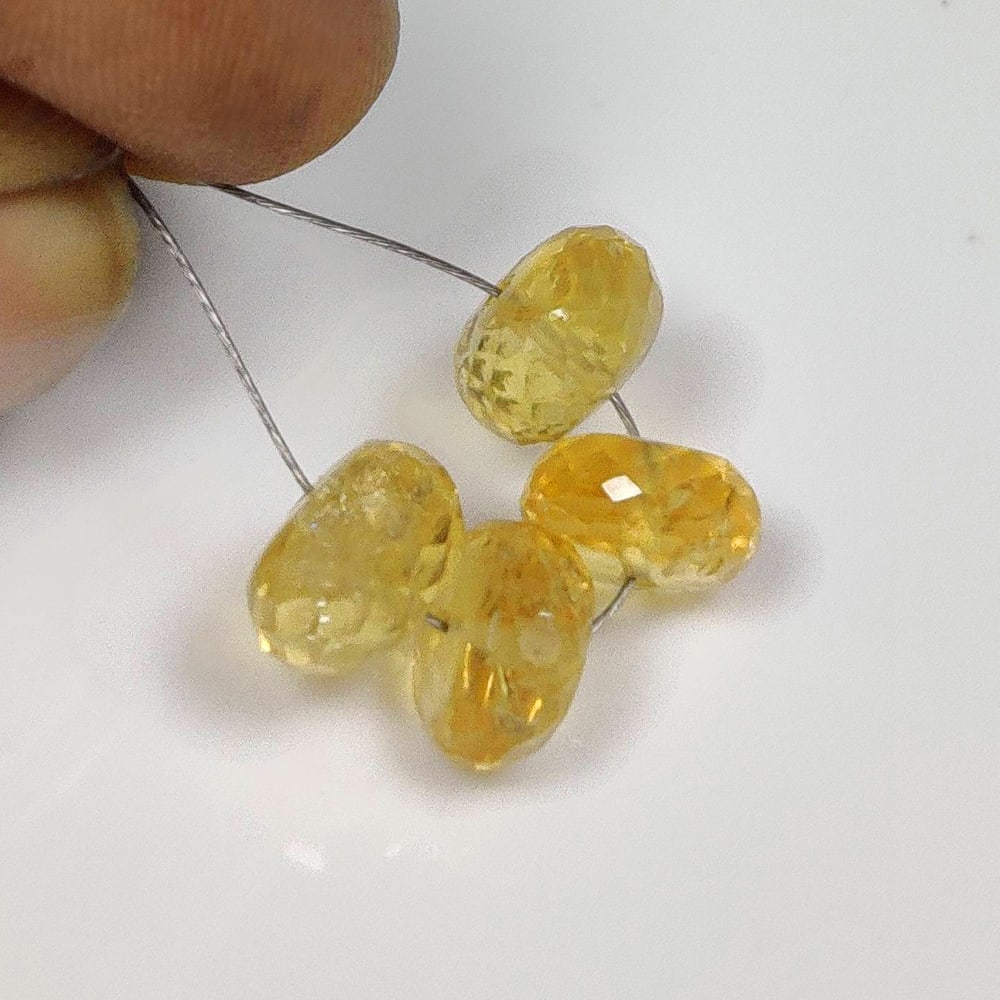 9.12 Ct Natural Yellow Citrine Round Cut Beads: Weight - 9.12 Ct / Size - 7.80 - 8.10 mm / 4 Pc's / Shape - Round Cut Beads / Color - Yellow / Clarity - VVS / Origin - Brazil / Treatment - Heated