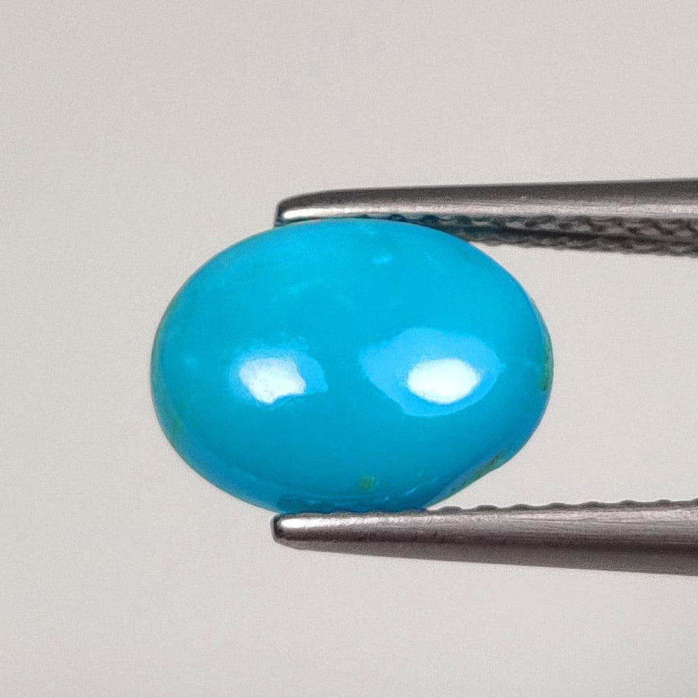 1.85 Ct Natural Blue Turquoise Oval Cab: Weight - 1.85 Ct / Dimensions - 10.00 x 8.10 x 3.30 mm / Shape - Oval Cab / Color - Blue / Transparency - Translucent / Origin - Egypt / Treatment - None