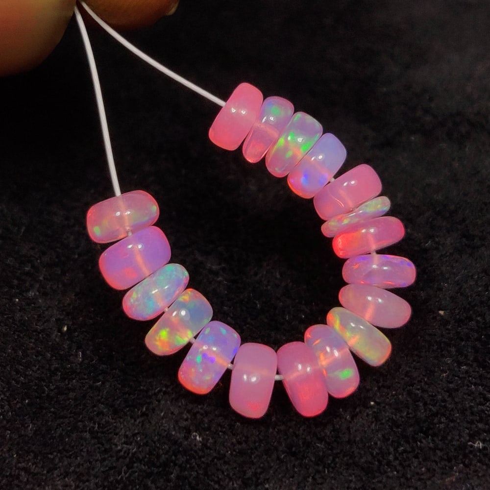 5.18 Ct Natural Drilled Pink Fire Opal Round Beads: Weight - 5.18 Ct / Dimensions - 4.60 - 5.00 mm / 18 No's / Shape - Drilled Round Beads / Color - Pink / Clarity - Transparent / Origin - Ethiopia / Treatment - Color Heated