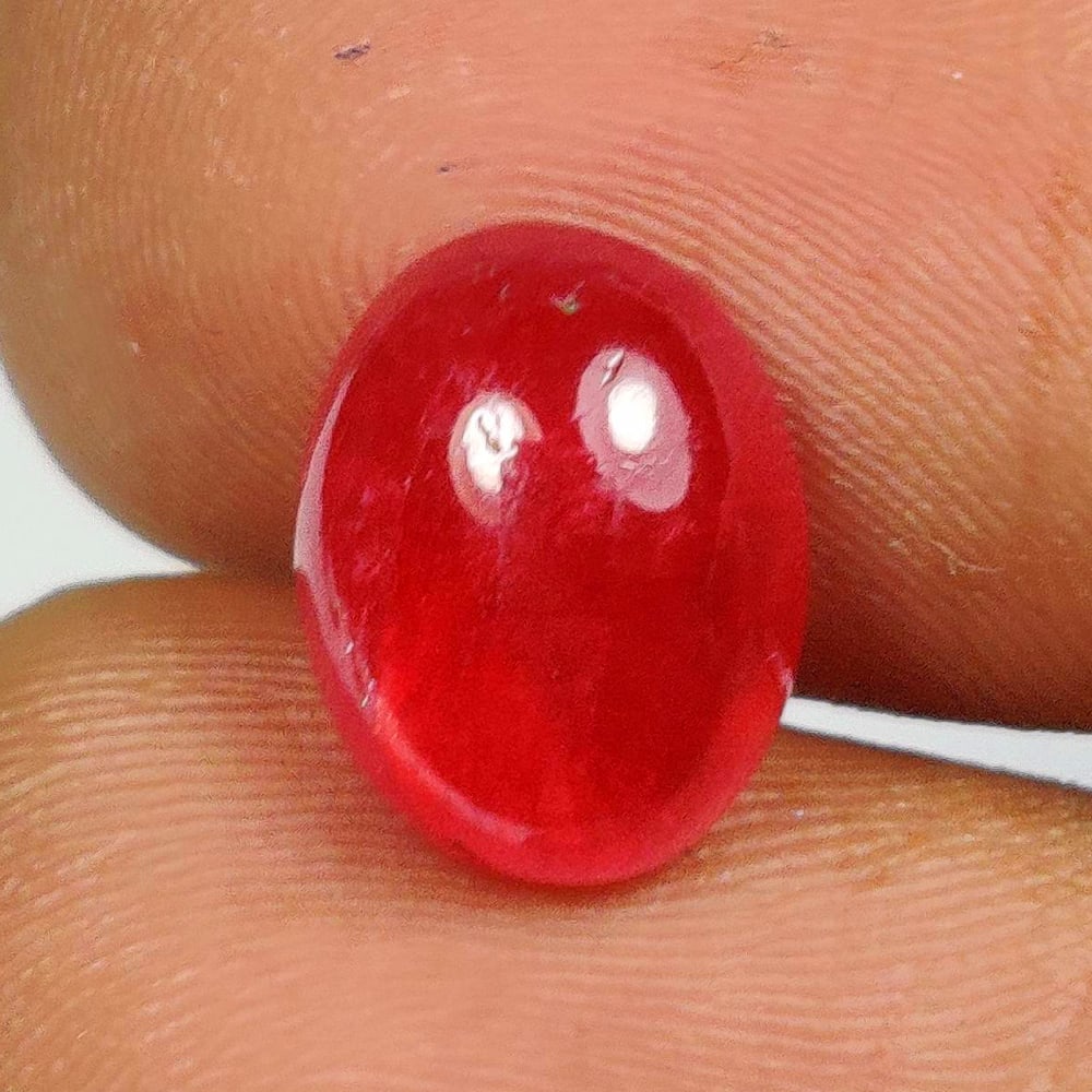3.82 Ct Natural Rhodonite Oval Cab (1 of 2)