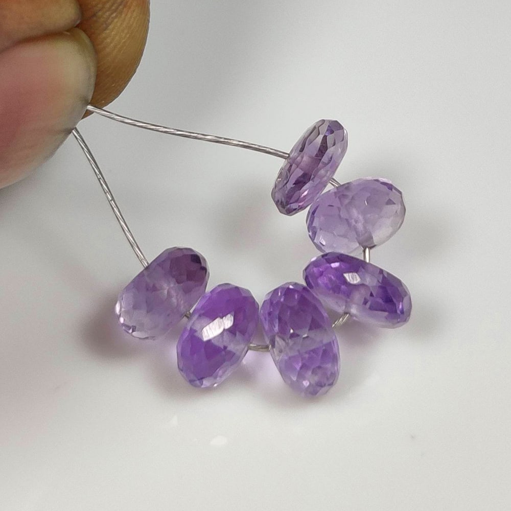 10.00 Ct Natural Purple Amethyst Round Cut Beads: Weight - 10.00 Ct / Dimensions - 6.90 - 7.80 mm / 6 Pc's / Shape - Round Cut Beads / Color - Purple / Clarity - Transparent / Origin -Brazil / Treatment - Heated