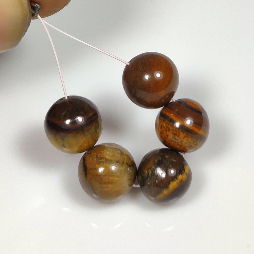 19.31 Ct Natural Tiger Eye Round Ball Beads: Weight - 19.31 Ct / Dimensions - 8.00 - 8.40 mm / 5 Pc's / Top Class Quality / Round Ball Beads / Origin - Burmese / Comments - None