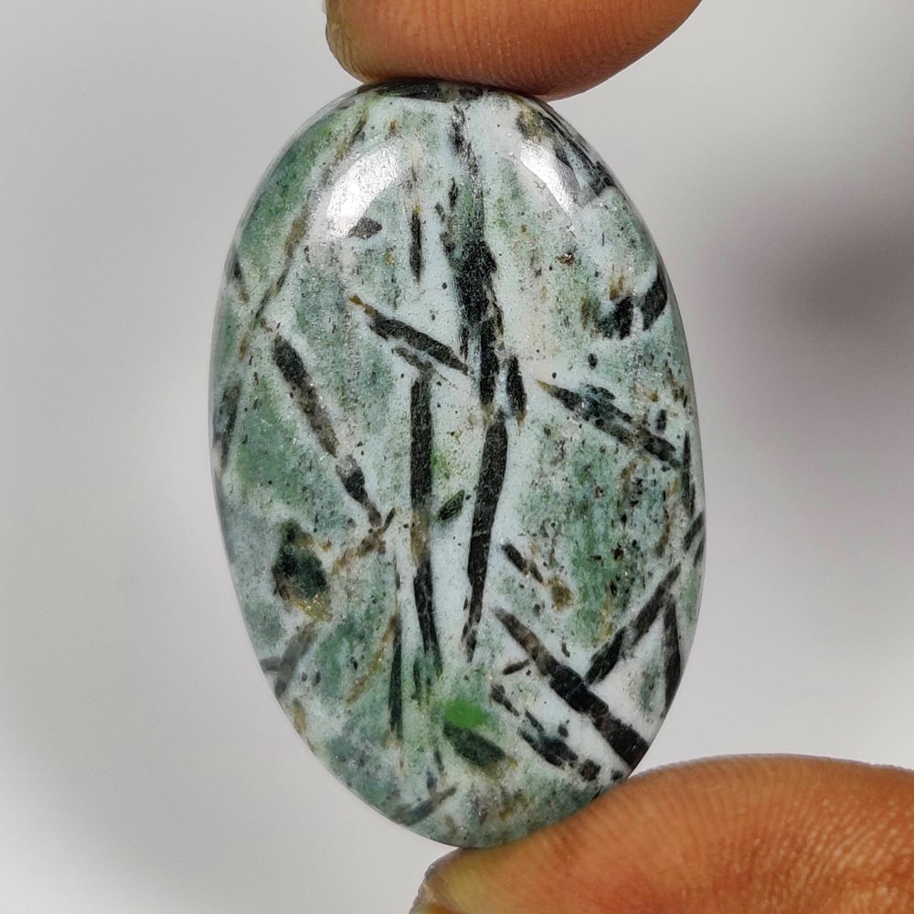 31.52 Ct Natural Hornblende Jasper Quartz Oval Cab: Weight - 31.52 Ct / Dimensions - 33.00 x 20.50 x 5.40 mm / Shape - Oval Cab / Clarity - Opaque / Origin - Brazil / Treatment - None