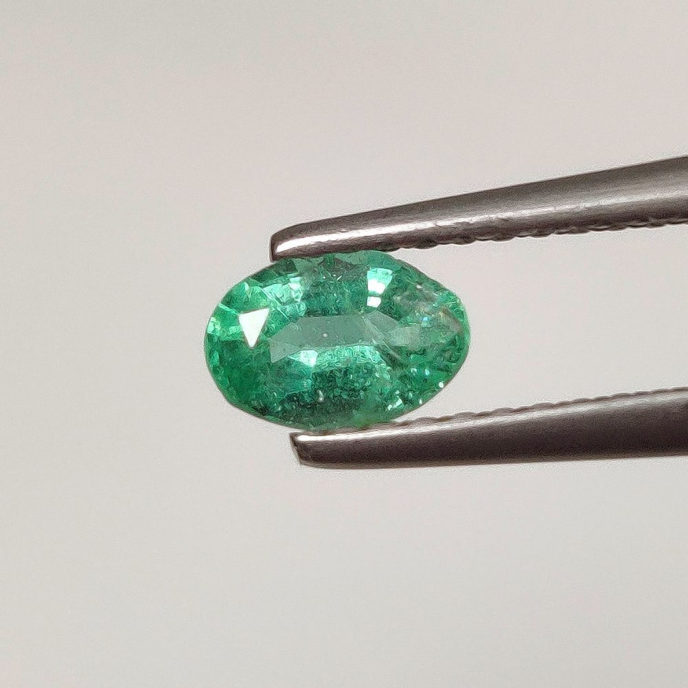 0.40 Ct Natural Zambian Green Emerald Oval Cut: Weight - 0.40 Ct / Dimensions - 8.80 x 4.00 x 3.00 mm / Shape - Oval Cut / Color - Green / Clarity - SI / Origin - Zambia / Treatment - Natural Emeralds are commonly enhanced by oil