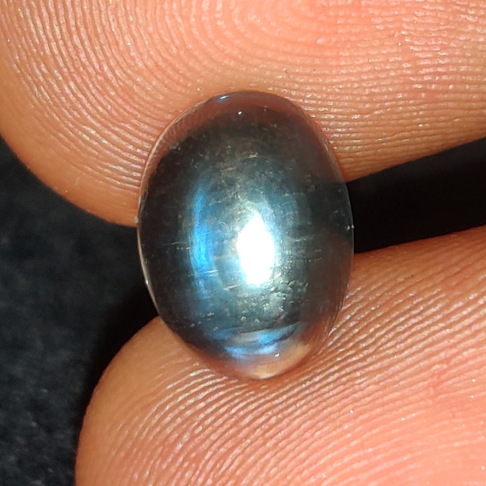 2.26 Ct Natural Blue Tint Moonstone Oval Cab: Weight - 2.26 Ct / Size - 9.30 x 7.00 x 5.00 mm / Shape - Oval Cab / Clarity - Semi-Transparent / Origin - India / Treatment - None