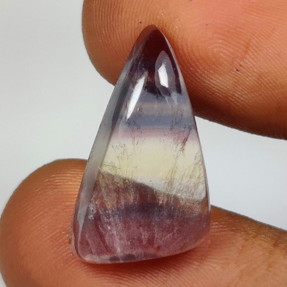 10.61 Ct Natural Bicolor Flourite Fancy Cab: weight - 10.61 Ct / Size - 19.20 x 11.50 x 5.40 mm / Shape - Fancy Cab / Origin - Brazil / Treatment - None