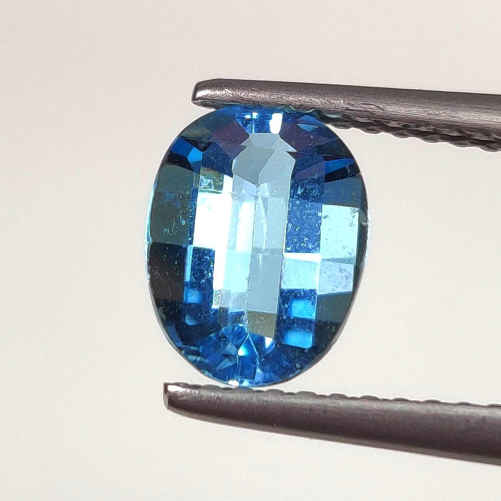 1.38 Ct Natural Blue Topaz Fancy Oval Cut: Weight - 1.38 Ct / Dimensions - 8.20 x 6.10 x 3.70 mm / Shape - Fancy Oval Cut / Color - Blue / Clarity - VVS / Origin - Brazil / Treatment - Irradiated