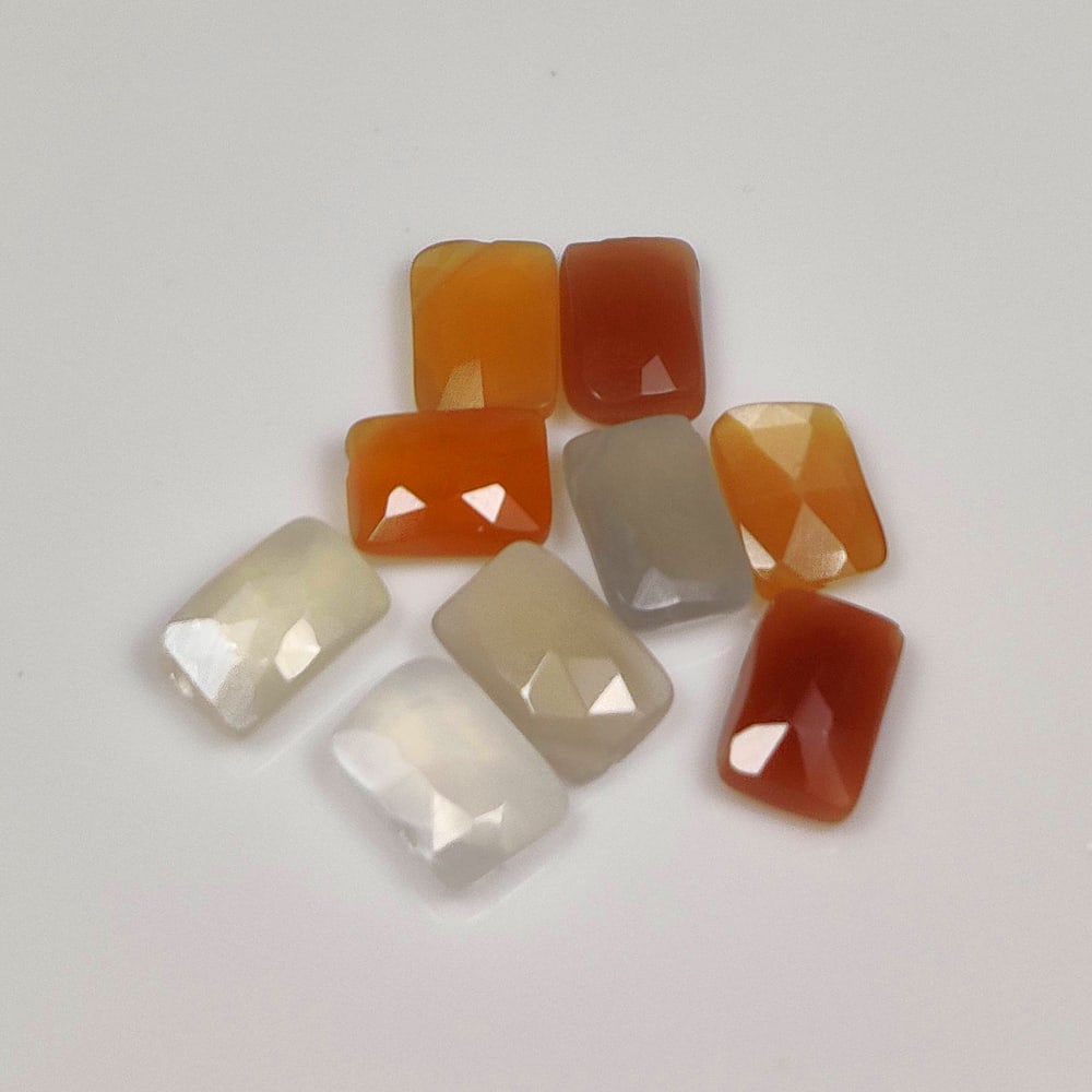 9.94 Ct Natural Moonstone Cushion Cut Beads: Weight - 9.94 Ct / Size - 7.5x5.3 - 8.3x5.5 mm / 9 Pc's / Shape - Cushion Cut Beads / Clarity - Opaque / Origin - India / Treatment - None