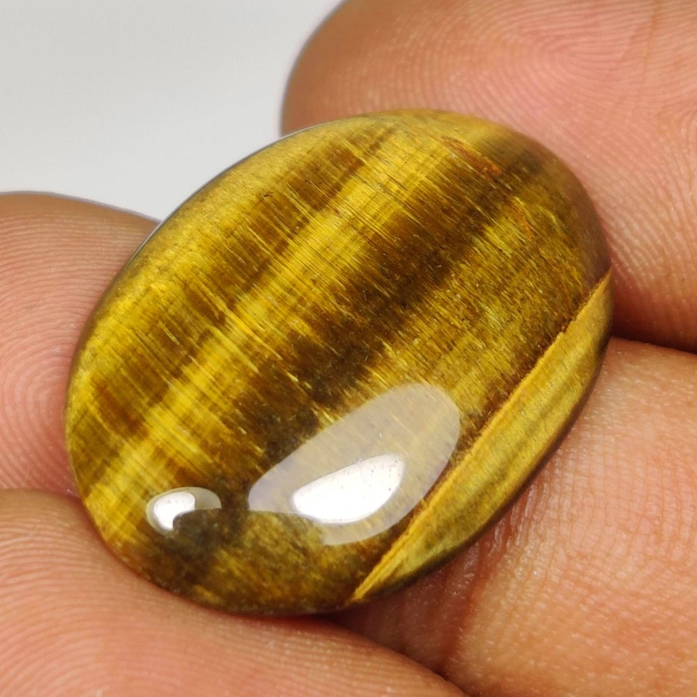 17.00 Ct Natural Tiger Eye Oval Cab: Weight - 17.00 Ct / Dimensions - 25.10 x 17.70 x 5.10 mm / Top Class Quality / Oval Cab / Origin - Burmese / Comments - None