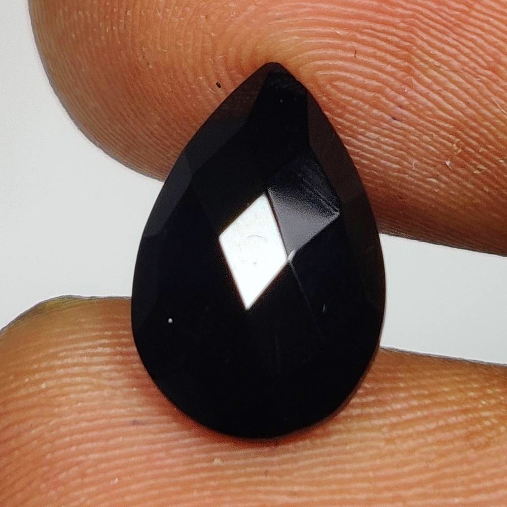 2.63 Ct Natural Black Onyx Pear Cut: Weight - 2.63 Ct / Size - 12.10 x 8.10 x 4.70 mm / Shape - Pear Cut / Color - Black / Clarity - OPaque / Origin - Africa / Treatment - None