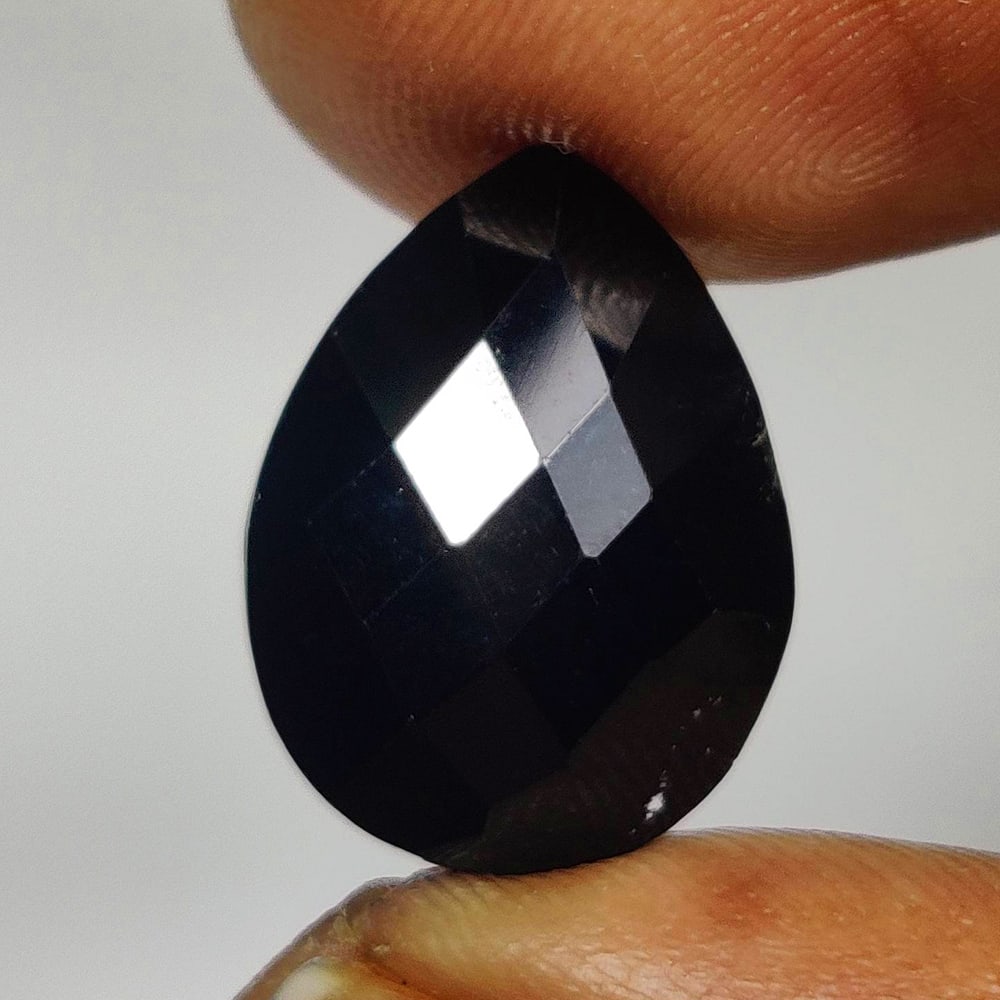 8.54 Ct Natural Black Onyx Pear Cut: Weight - 8.54 Ct / Size - 16.10 x 12.10 x 5.50 mm / Shape - Pear Cut / Color - Black / Clarity - OPaque / Origin - Africa / Treatment - None