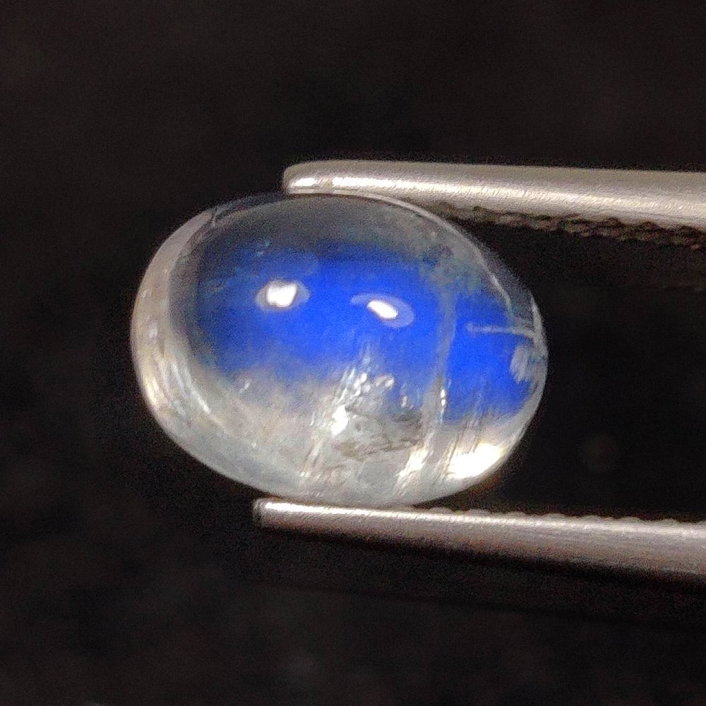 2.80 Ct Natural Blue Tint Moonstone Oval Cab: Weight - 2.80 Ct / Size - 9.50 x 7.00 x 5.60 mm / Shape - Oval Cab / Clarity - Semi-Transparent / Origin - India / Treatment - None