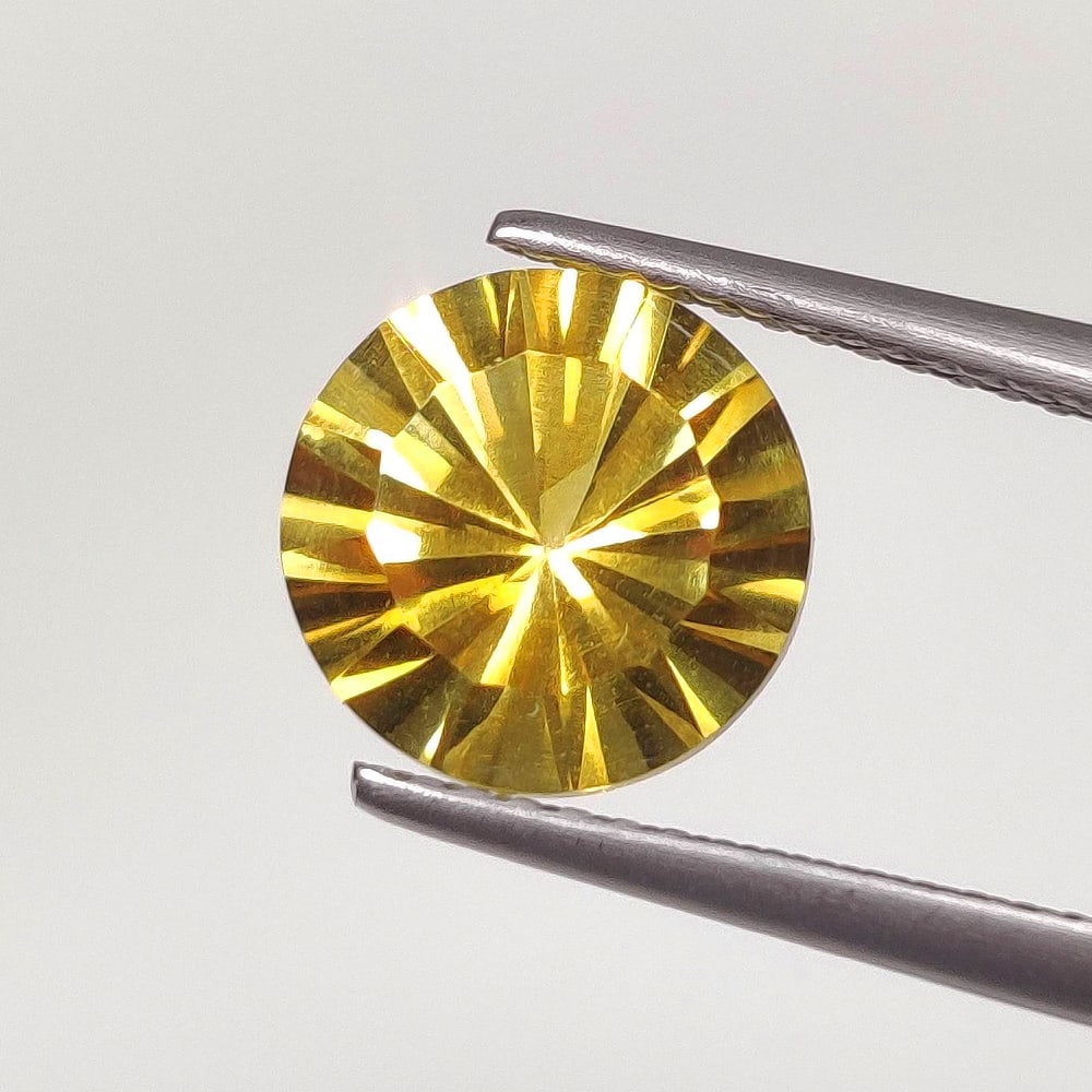 2.74 Ct Natural Yellow Citrine Round Cut: Weight - 2.74 Ct / Dimensions - 9.00 x 9.00 x 6.50 mm / Shape - Round Cut / Color - Yellow / Clarity - VVS / Origin - Brazil / Treatment - Heated