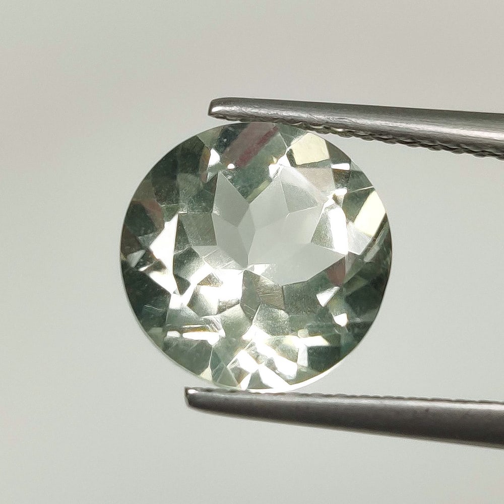 3.21 Ct Natural Green Amethyst Round Cut: Weight - 3.21 Ct / Size - 9.90 x 9.90 x 6.20 mm / Shape - Round Cut / Color - Green / Clarity - VVS / Origin - Brazil / Treatment - Heated