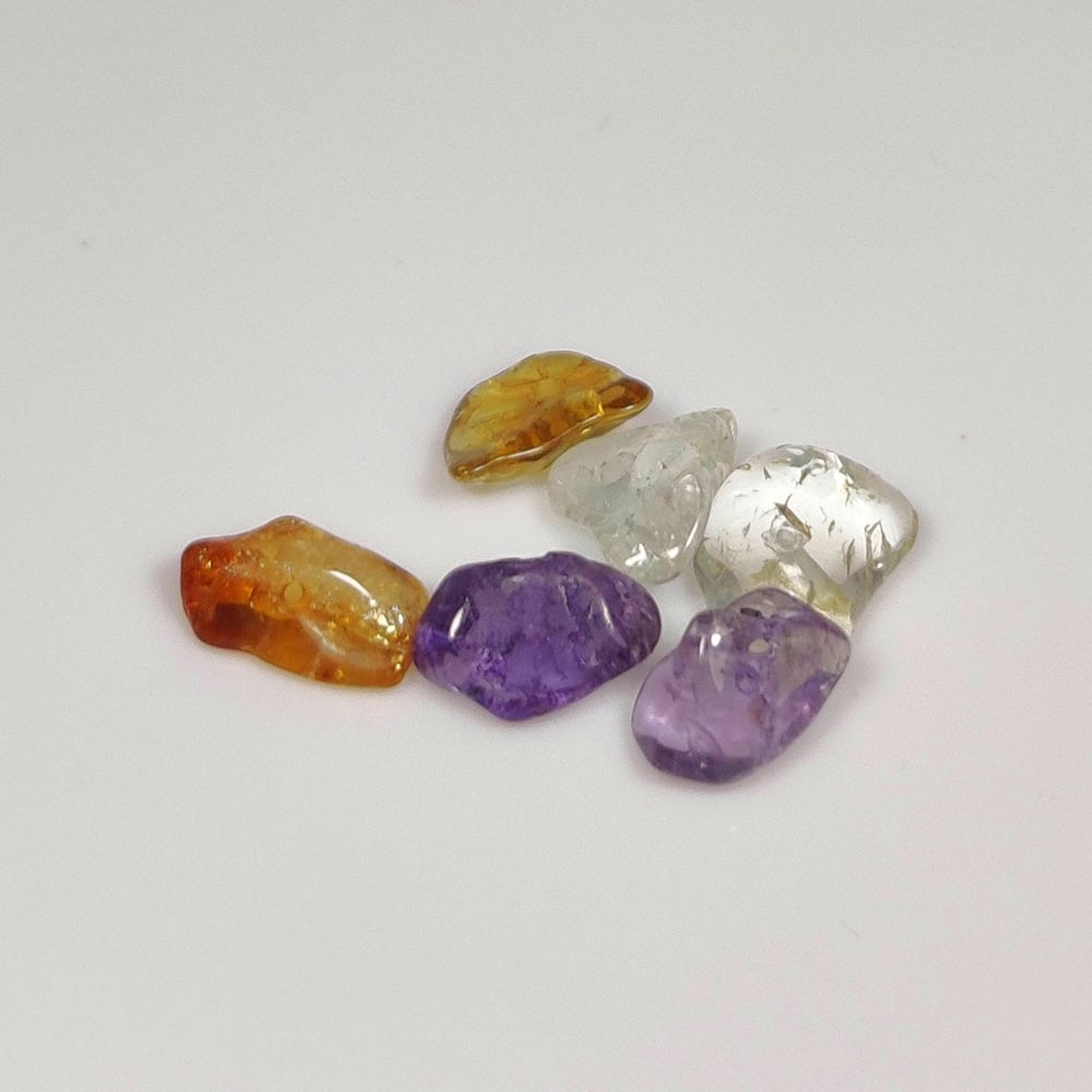 9.14 Ct Natural Semi-Precious Unshape Beads: Weight - 9.14 Ct / Dimensions - 9.50 - 10.00 mm / 6 Pc's / shape - Unhape Beads / Color - Purple / Clarity - Transparent / Origin - Brazil / Treatment - Heated