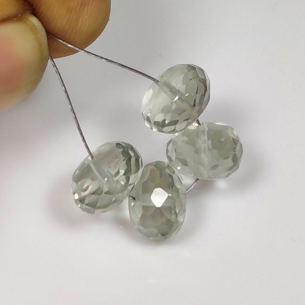12.22 Ct Natural Green Amethyst Round Beads: Weight - 12.22 Ct / Dimensions - 8.30 - 8.50 mm / 4 Pc's / Shape - Round Beads / Color - Green / Clarity - Transparnet / Origin -Brazil / Treatment - Heated