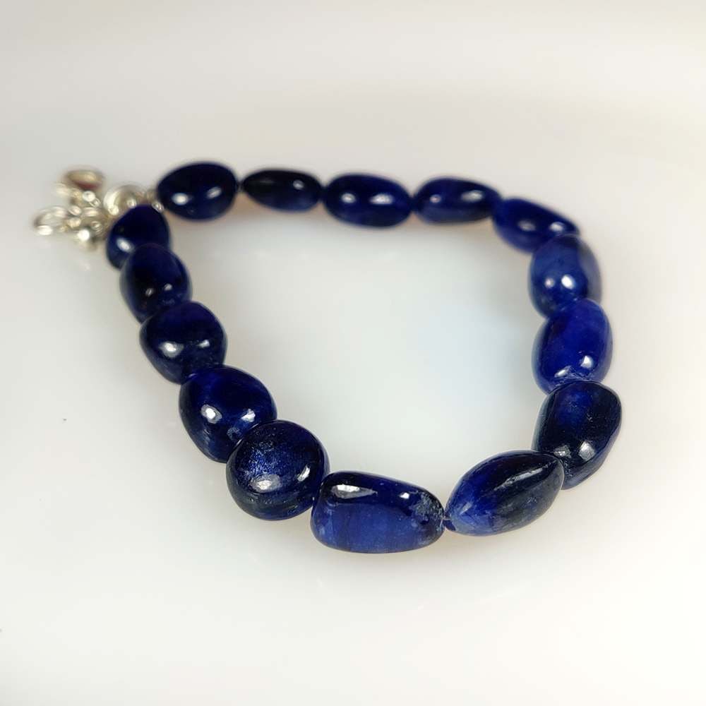 67.21 Ct Natural Blue Sapphire Dumble Beads: Weight - 67.21 Ct / Size- 8.3x6.6 - 11.1x7.3 mm / 15 Pc's / 7.5" inches / Shape - Dumble Beads / Clarity - VVS / Origin - Sri Lanka / Treatment - Standard Heated