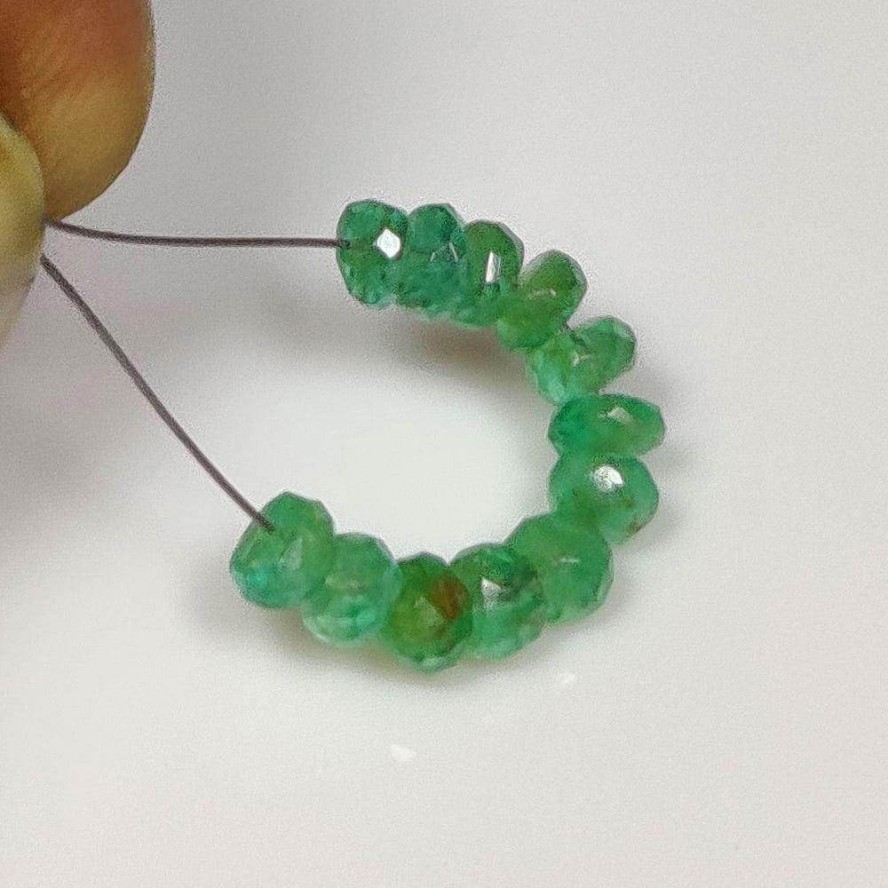 2.41 Ct Natural Zambian Emerald Round Cut Beads: Weight - 2.41 Ct / Dimensions - 3.30 - 3.50 mm / 12 Pc's / Shape - Round Cut Beads / Color - Green / Clarity - SI / Origin - Zambia / Treatment - Natural Emeralds are commonly enhanced by oil