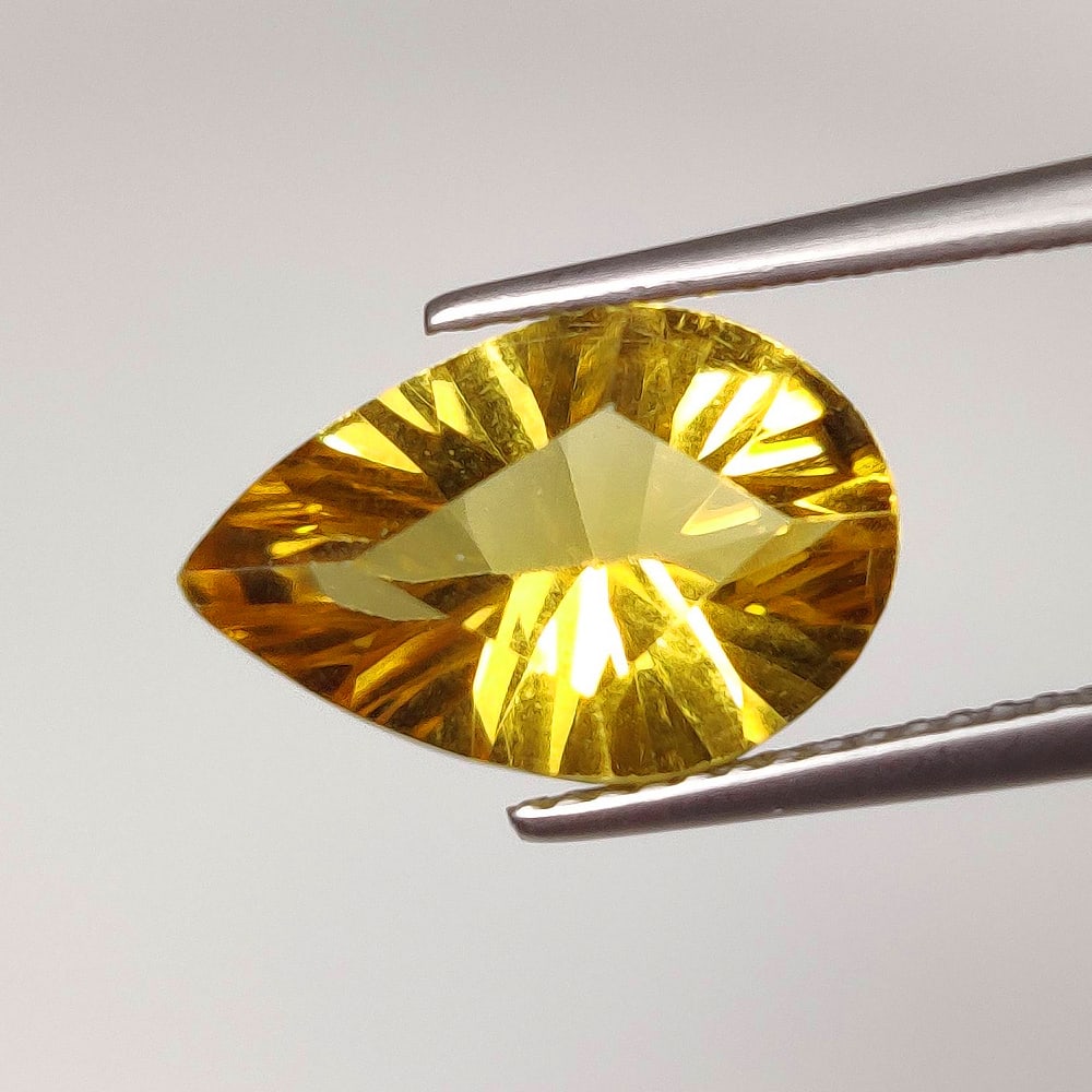 3.88 Ct Natural Yellow Citrine Pear Cut: Weight - 3.88 Ct / Dimensions - 14.00 x 9.50 x 6.30 mm / Shape & Cut - Pear Cut / Color - Yellow / Transparency - VVS / Origin - Brazil / Comments - Heated