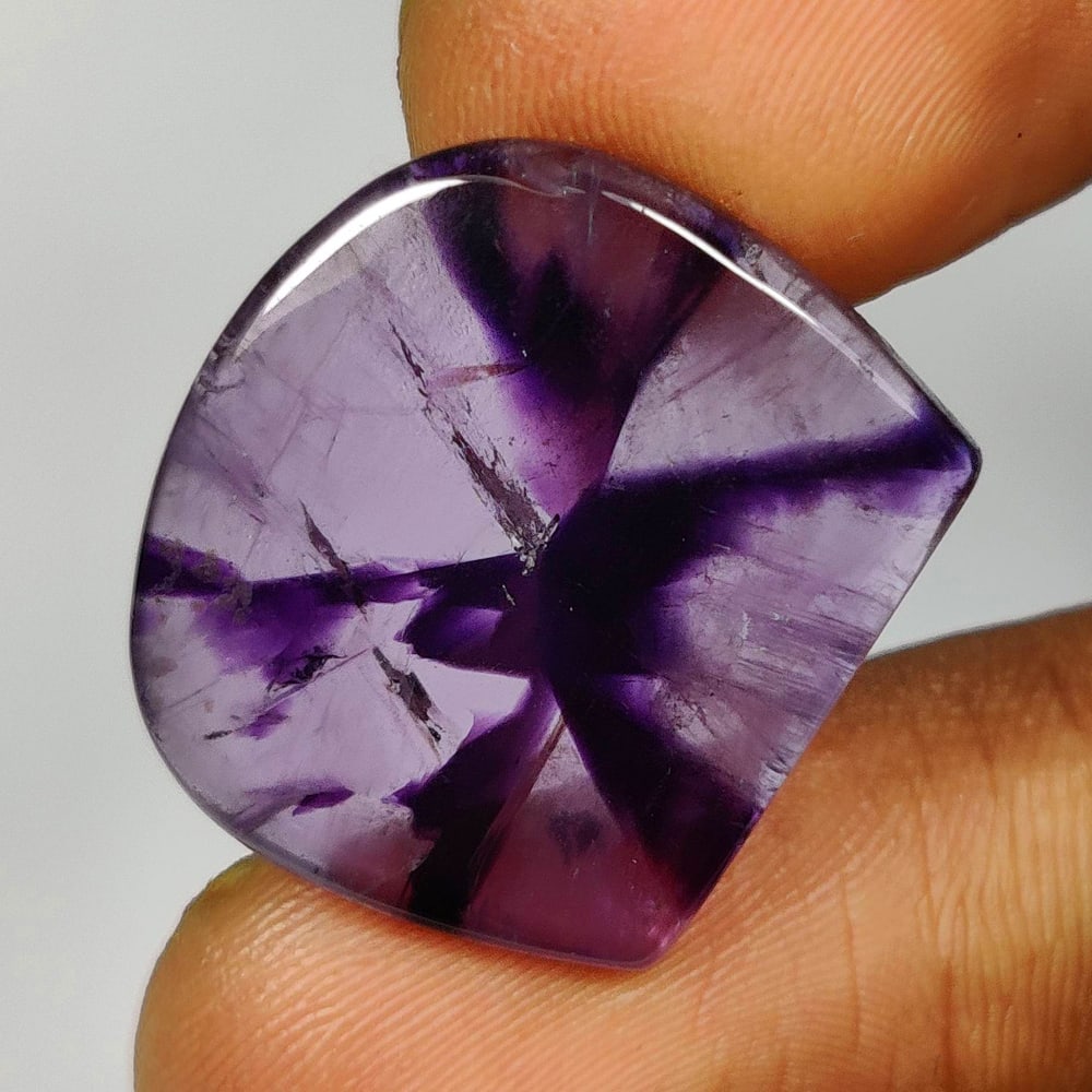 13.65 Ct Natural Purple Star Amethyst Fancy Cab: Weight - 13.65 Ct / Dimensions - 20.00 x 18.00 x 3.50 mm / Shape - Fancy Cab / Color - Purple / Clarity - Transparent / Origin -Brazil / Treatment - Heated