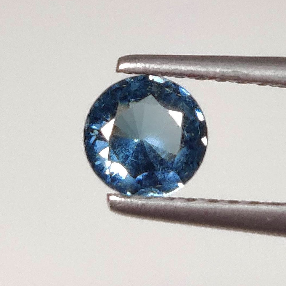 0.50 Ct Natural Blue Sapphire Round Cut: Weight - 0.50 Ct / Dimensions- 5.00 x 5.00 x 2.70 mm / Shape - Round Cut / Clarity - SI / Origin - Sri Lanka / Treatment - Standard Heated