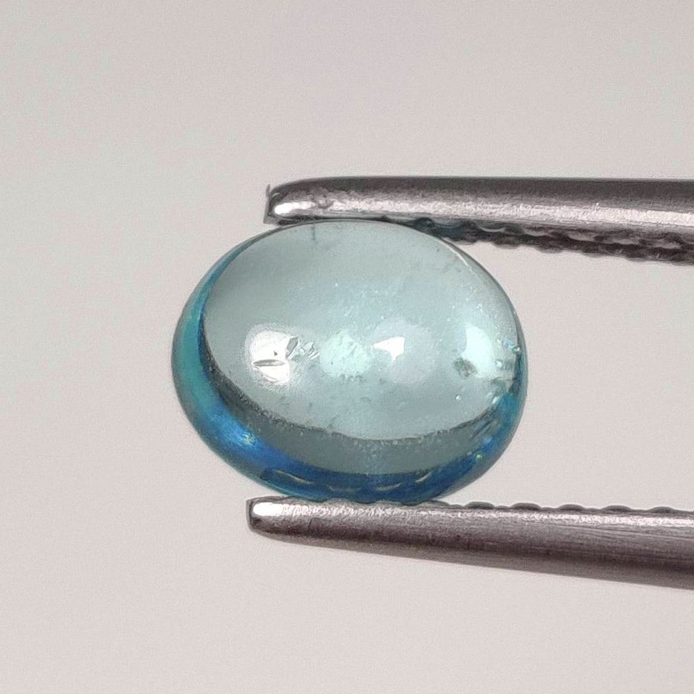 1.01 Ct Natural Neon Blue Apatite Oval Cab: Weight - 1.01 Ct / Dimensions - 7.00 x 5.50 x 3.20 mm / Top Class Quality / Oval Cab / Origin - Brazil / Treatment - None