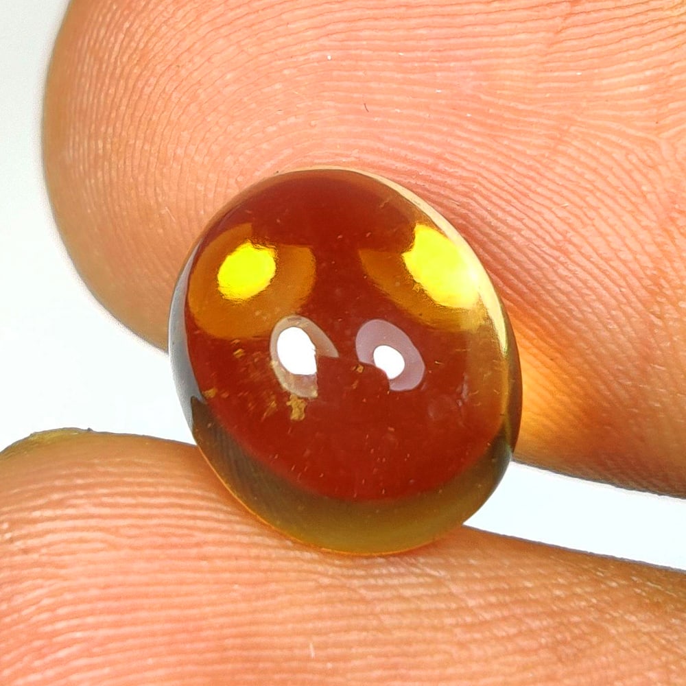 4.05 Ct Natural Yellow Citrine Oval Cab: Weight - 4.05 Ct / Dimensions - 11.00 x 9.00 x 5.60 mm / Shape & Cut - Oval Cab / Color - Yellow / Transparency - VVS / Origin - Brazil / Comments - Heated