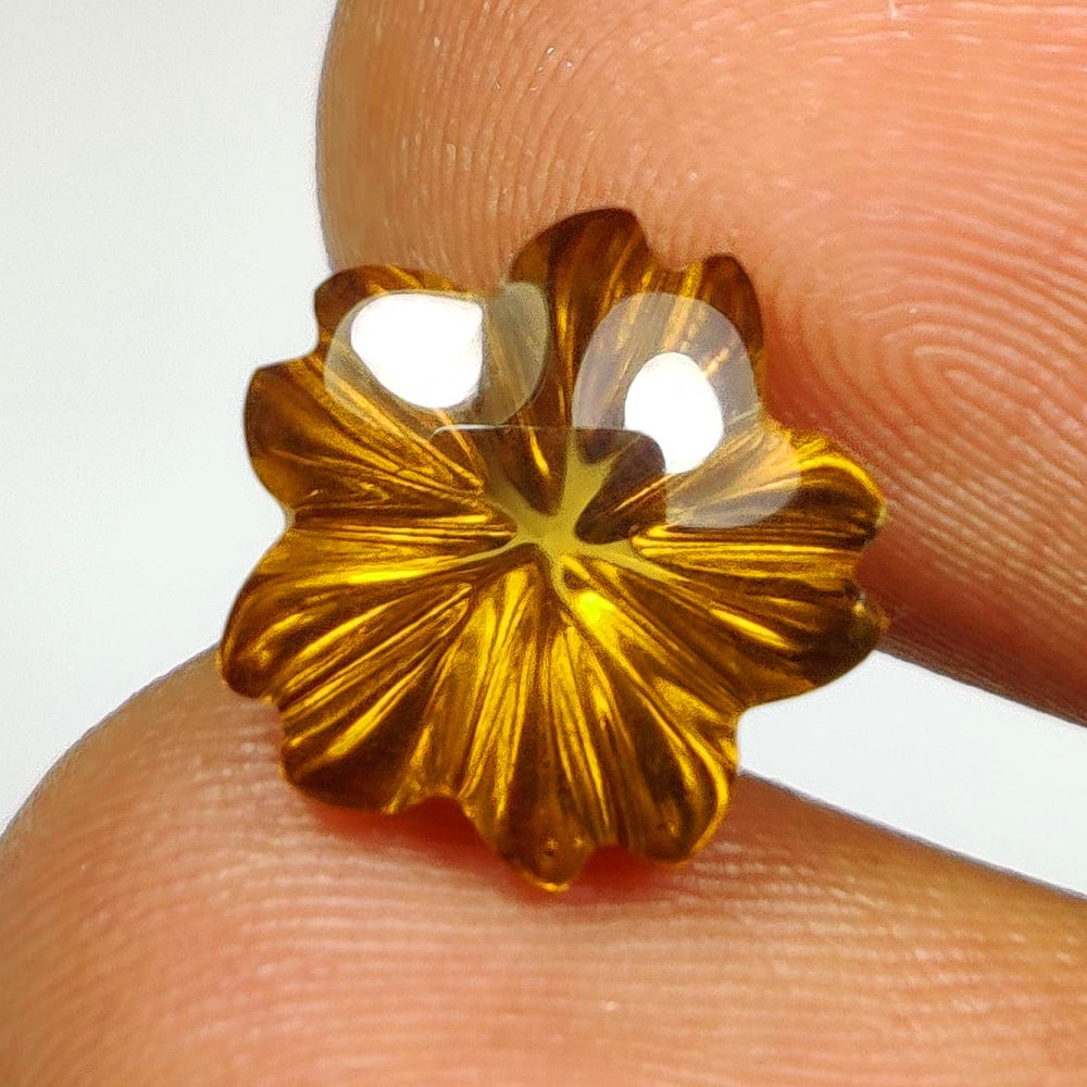 4.30 Ct Natural Yellow Citrine Flower Carving: Weight - 4.30 Ct / Dimensions - 10.50 x 7.50 x 7.50 mm / Shape - Flower Carving / Color - Yellow / Clarity - VVS / Origin - Brazil / Treatment - Heated
