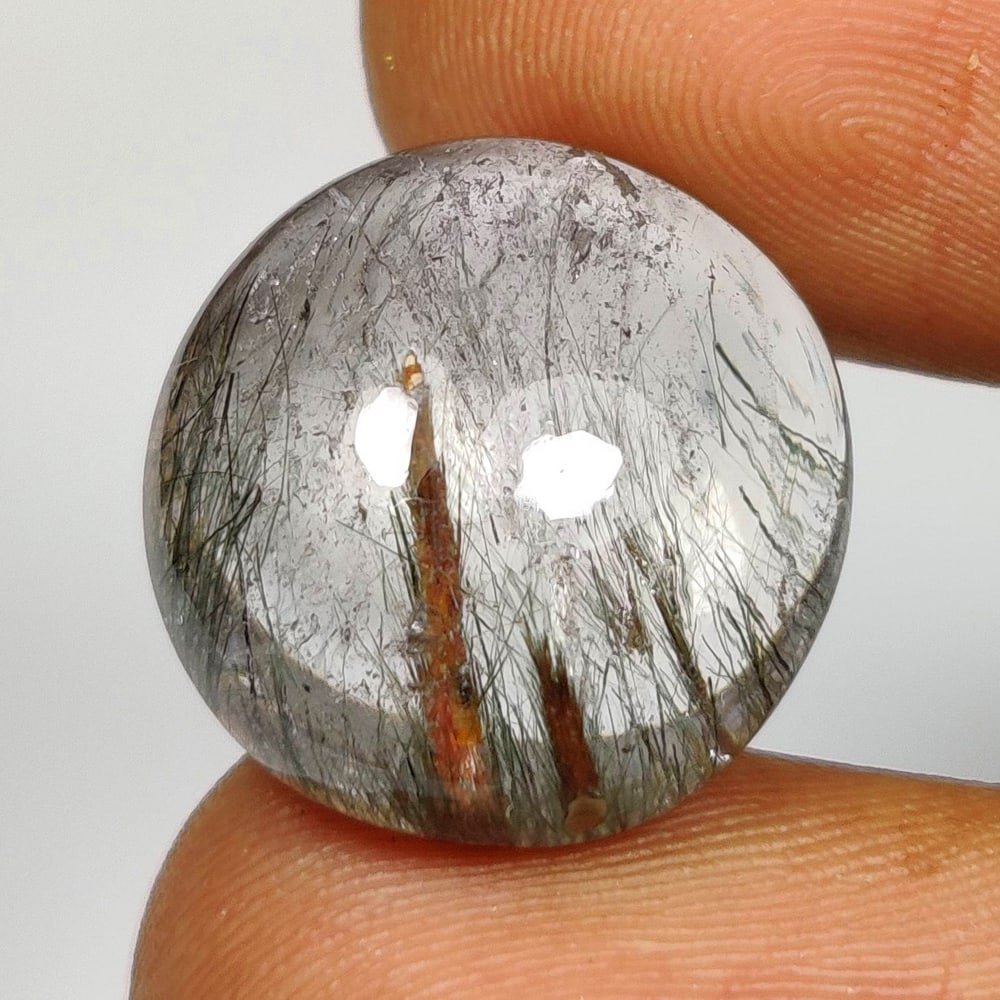 17.32 Ct Natural Rutile Quartz Round Cab: Weight - 17.32 Ct / Size - 16.50 x 16.00 x 9.00 mm / Shape - Round Cab / Clarity - Transparent / Origin - Norway / Treatment - None