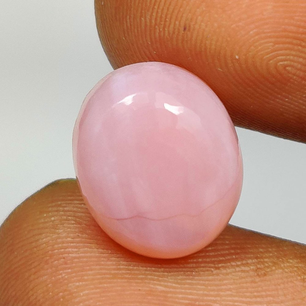 4.64 Ct Natural Pink Opal Oval Cab: Weight - 4.64 Ct / Size - 12.30 x 10.60 x 5.30 mm / Shape - Oval Cabochon / Clarity - Opaque / Origin - Peru / Treatment - None