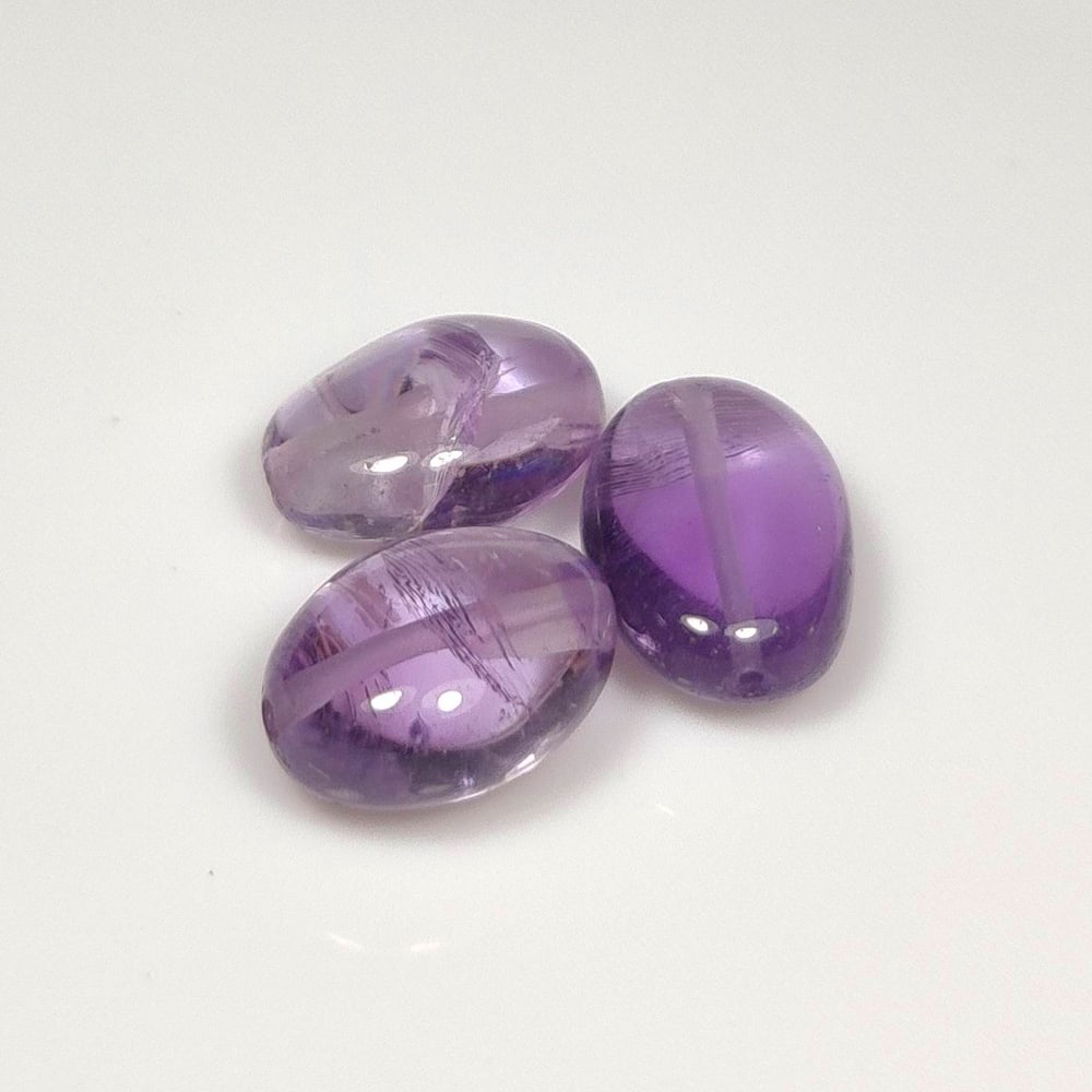 17.28 Ct Natural Purple Amethyst Oval Beads: Weight - 17.28 Ct / Size - 12.4x9.5 - 13.4x9.5 mm / 3 PC's / Shape - Oval Beads / Color - Purple / Clarity - VVS / Origin -Brazil / Treatment - Heated
