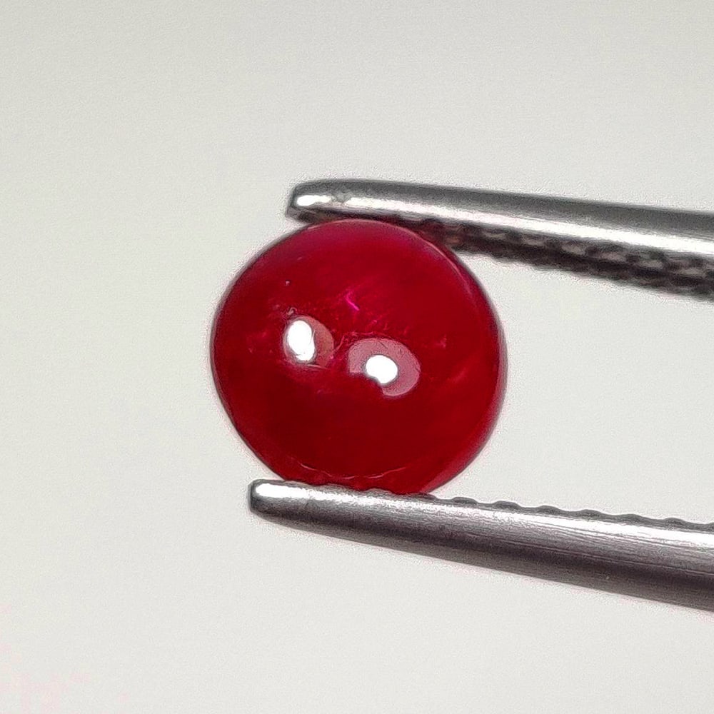 1.25 Ct Natural Red Ruby Round Cab: Weight - 1.25 Ct / Size - 6.30 x 6.30 x 3.00 mm / Shape - Round Cab / Color - Blood Red / Clarity - SI / Origin - Mozambique / Treatment - Color Enhanced by Glass Filling