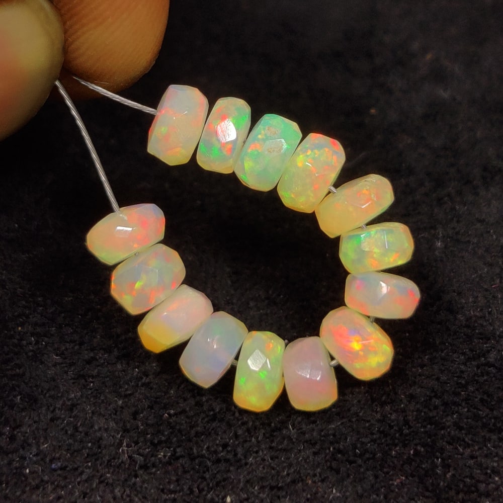 4.78 Ct Natural Multicolor Welo Opal Flash Fire Round Beads: Weight - 4.78 Ct / Dimensions - 4.70 - 4.90 mm / 14 Pc's / Shape & Cut - Round Beads / Color - Multicolor / Transparency - Translucent / Origin - Ethiopia / Comments - None