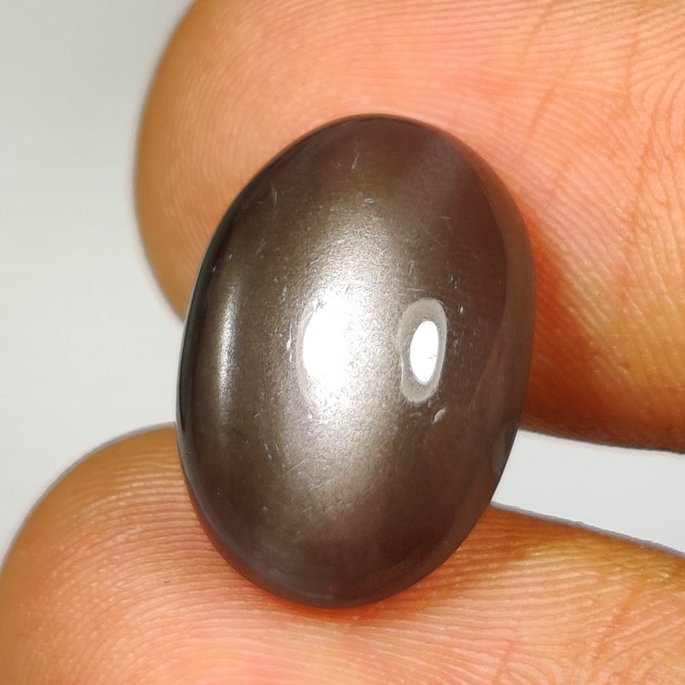 6.35 Ct Natural Sharp Line Moonstone OVal Cab: Weight - 6.35 Ct / Size - 16.00 x 11.10 x 6.50 mm / Shape - OVal Cabochon / Clarity - Semi-Transparent / Origin - India / Treatment - None