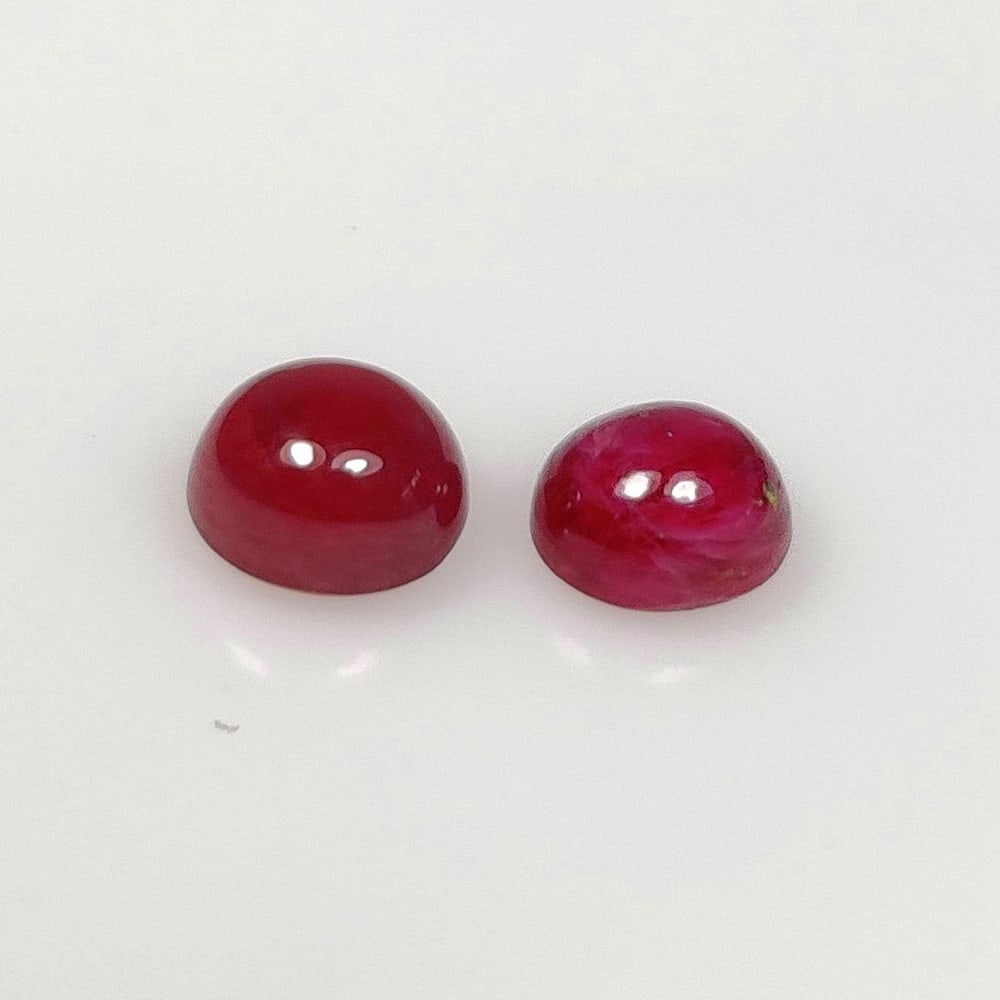 2.46 Ct Natural Red Ruby Round Cab Pair: Weight - 2.46 Ct / Size - 6.00 x 5.20 x 4.00 mm / 2 Pc's / Shape - Round Cab / Color - Blood Red / Clarity - SI / Origin - Mozambique / Treatment - Color Enhanced by Glass Filling