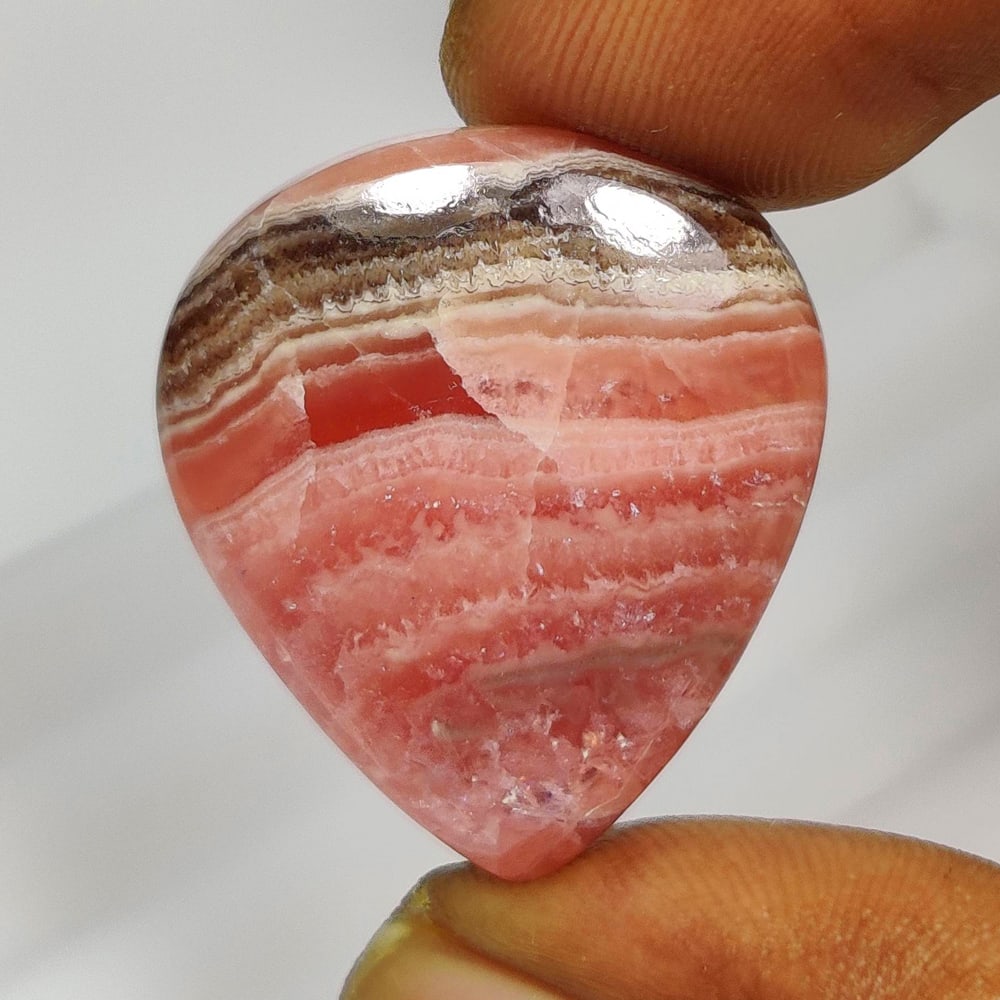 31.86 Ct Natural Rhodochrosite Pear Cab (1 of 2)