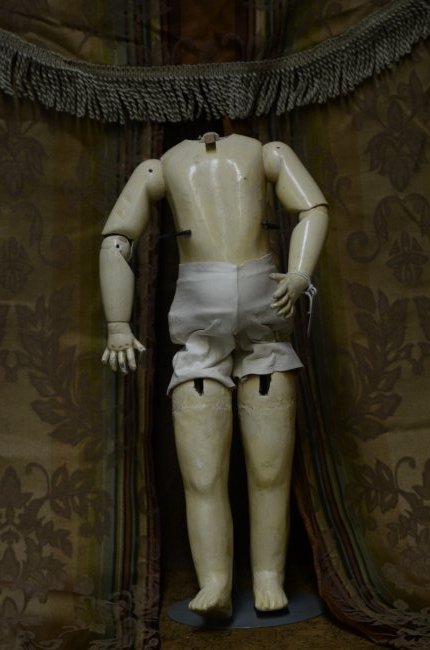 18" Antique French Doll Walker Body: 18" French doll walker body, it has a two inch neck socket, normal aged imperfections on body.