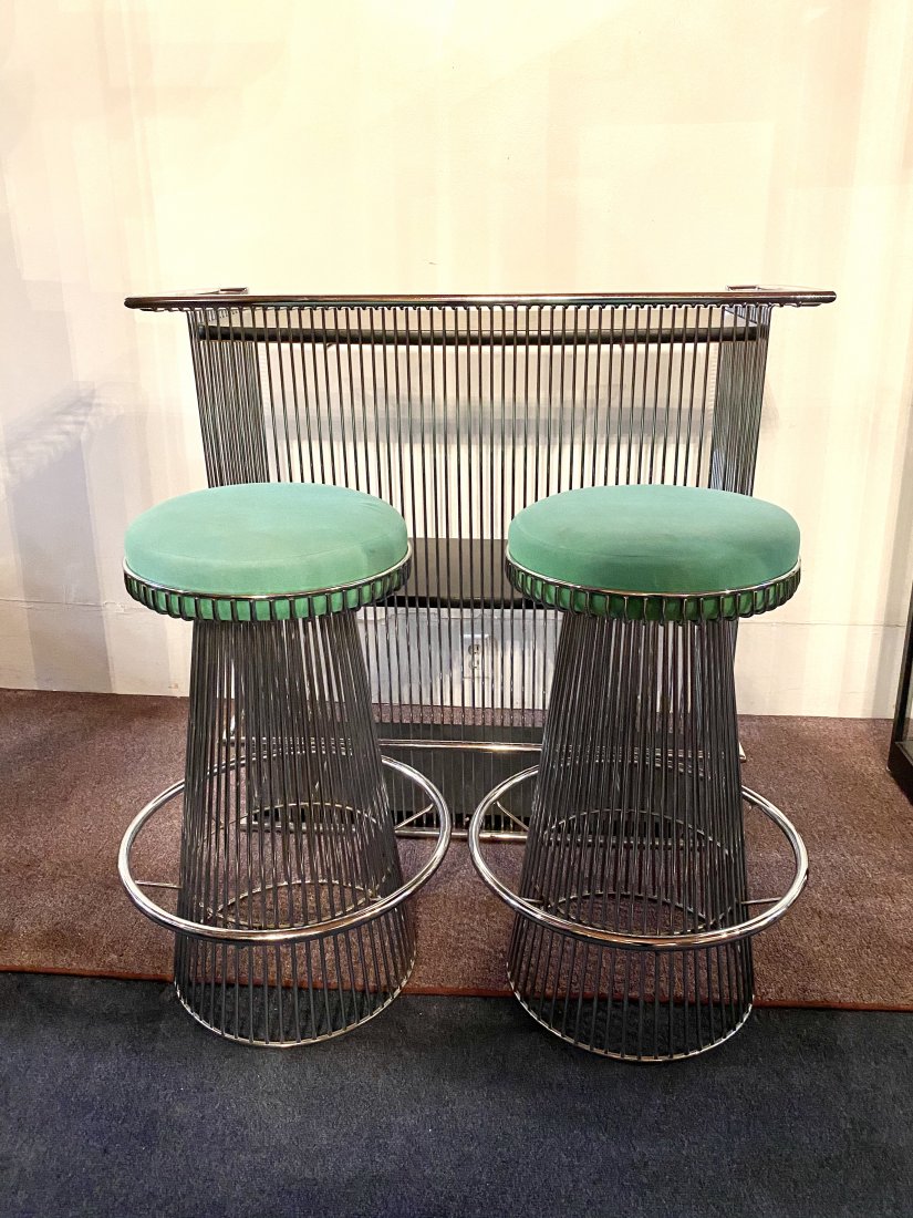 Mid Century Modern Chrome Bar with Stools: Mid Century Modern chrome bar with matching stools. A great look. The bar measures 42 inches wide by 17 inches deep by 40 inches tall. The stools are 18 inches in diameter at their widest point and 29
