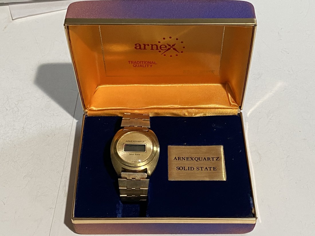 Arnex Quartz Solid State Man’s Wristwatch Original Box: Arnex Quartz Solid State Man’s Wristwatch Original Box. Box has some fading. Watch needs a battery. It is unknown if the watch works.