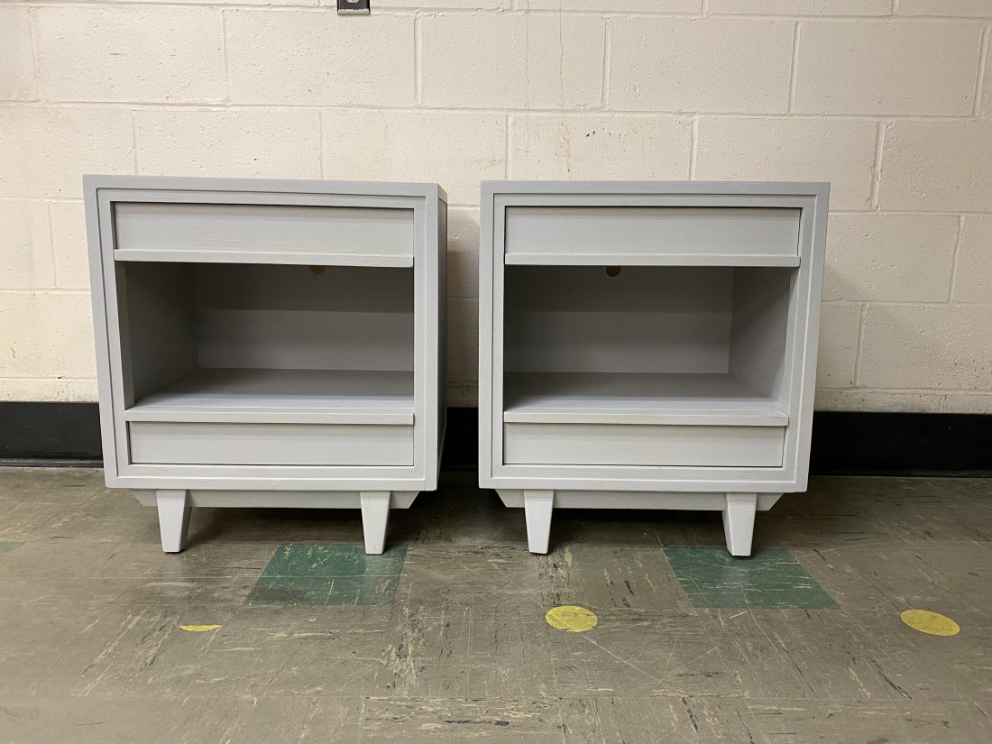 Pair of Mid Century Modern Night Stands: Pair of Mid Century Modern Night Stands. Each stand has 2 drawers. Each stand measures 22 inches by 16 inches by 25 inches.