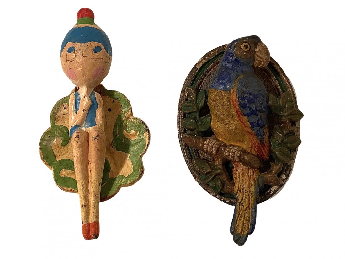 Antique Hubley Parrot and Whimsical Lady Door Knockers: Lot of 2 antique door knockers. Antique Hubley Parrot and Whimsical Lady Door Knockers. Original paint on both.
