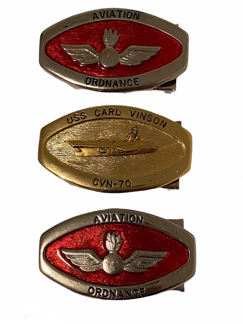 Lot of 3 Military Belt Buckles 2 Aviation 1 Navy: Lot of 3 Made in the USA Belt Buckles. 2 Aviation Ordinance belt buckles and 1 USS Carl Vinson CVN belt buckle. Each measures 3 inches by 1.75 inches.