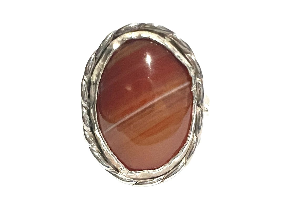 Vintage Sterling Silver Ring with Carnelian: Vintage Sterling Silver Ring with Carnelian. No markings, marks have been polished away, but tested and guaranteed sterling. Size 7.