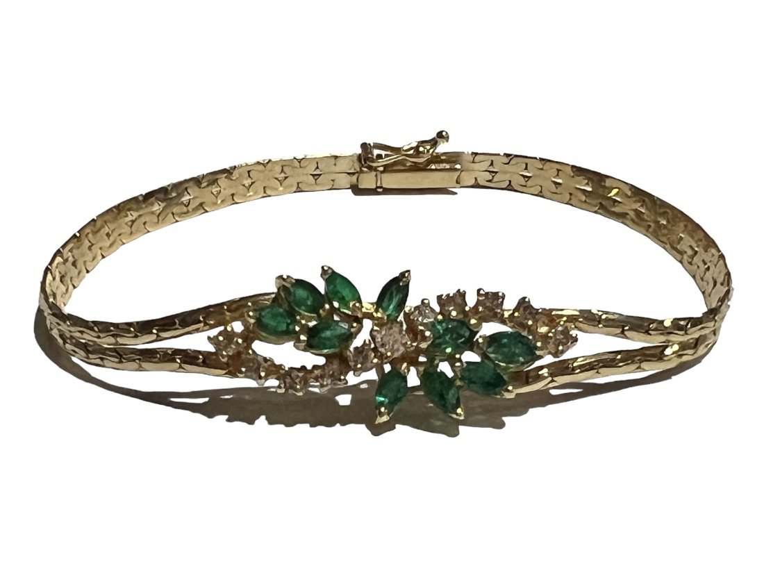 Italian 14K Gold Emerald and Diamond Bracelet: Italian 14K Gold Emerald and Diamond Bracelet. It weighs 8.4 grams. 7 Inches long. Shipping- There are 3 options for shipping to choose from. LiveShip, (Live Auctioneers shipping), Alternate In-house