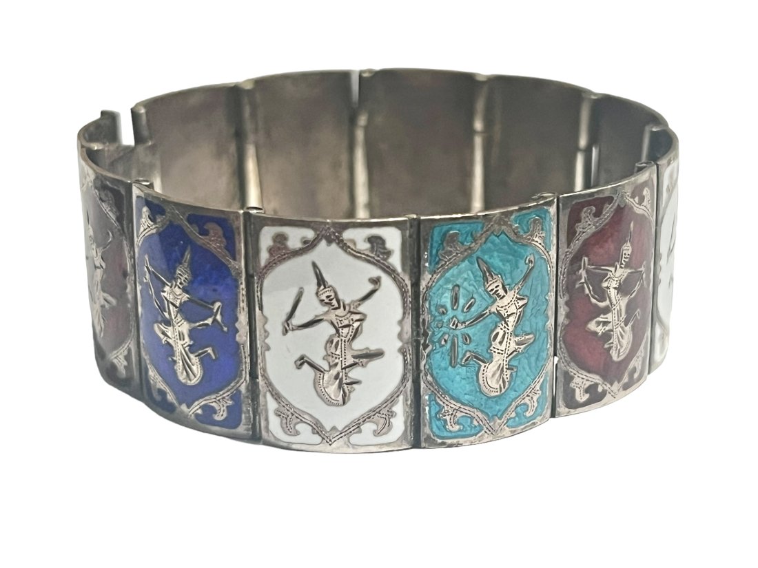 Antique Siam Sterling Silver Enameled Bracelet: Antique Siam Sterling Silver Enameled Bracelet. It measures 6.5 inches. 42.2 Grams. Shipping- In addition to LiveShip, Live Auctioneers Shipping), we also offer flat rate Priority shipping through the