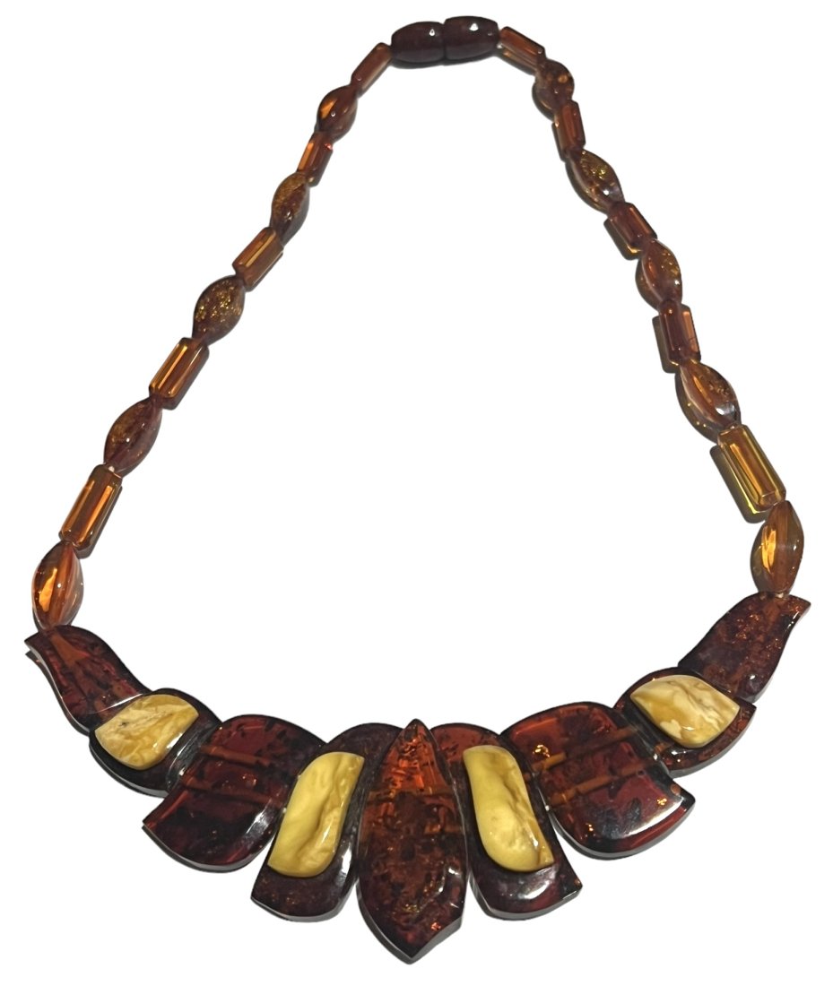 Amber Necklace with 2 Types of Amber: Amber Necklace with 2 Types of Amber. It is about 18 inches long and weighs 29.6 grams. Shipping- In addition to LiveShip, Live Auctioneers Shipping), we also offer flat rate Priority shipping through