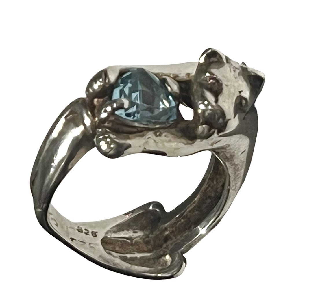 Sterling Silver Panther Ring with Blue Topaz: Sterling Silver Panther Ring with Blue Topaz. Size 6. Shipping- In addition to LiveShip, Live Auctioneers Shipping), we also offer flat rate Priority shipping through the USPS and we will also combine