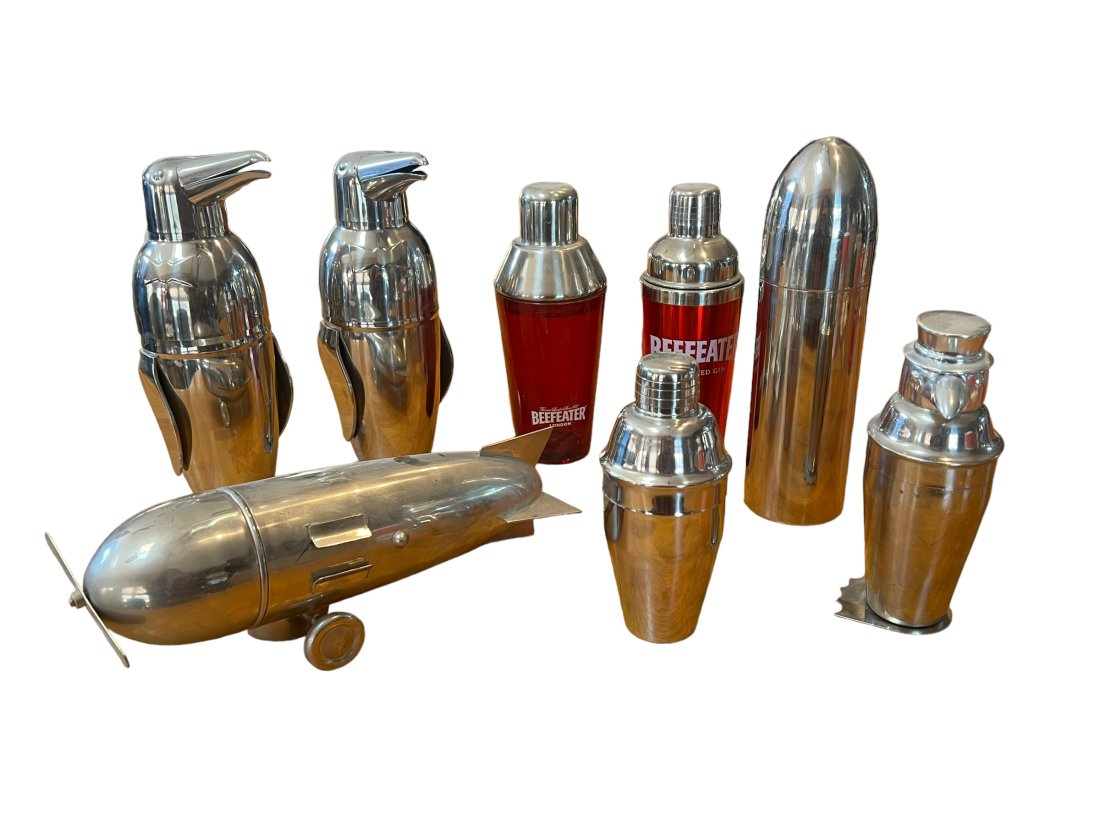 Lot of 8 Figural and Advertising Cocktail Shakers Penguins Zeppelin and More: Lot of 8 Figural and Advertising Cocktail Shakers. Penguins, zeppelin, Beefeater and more.